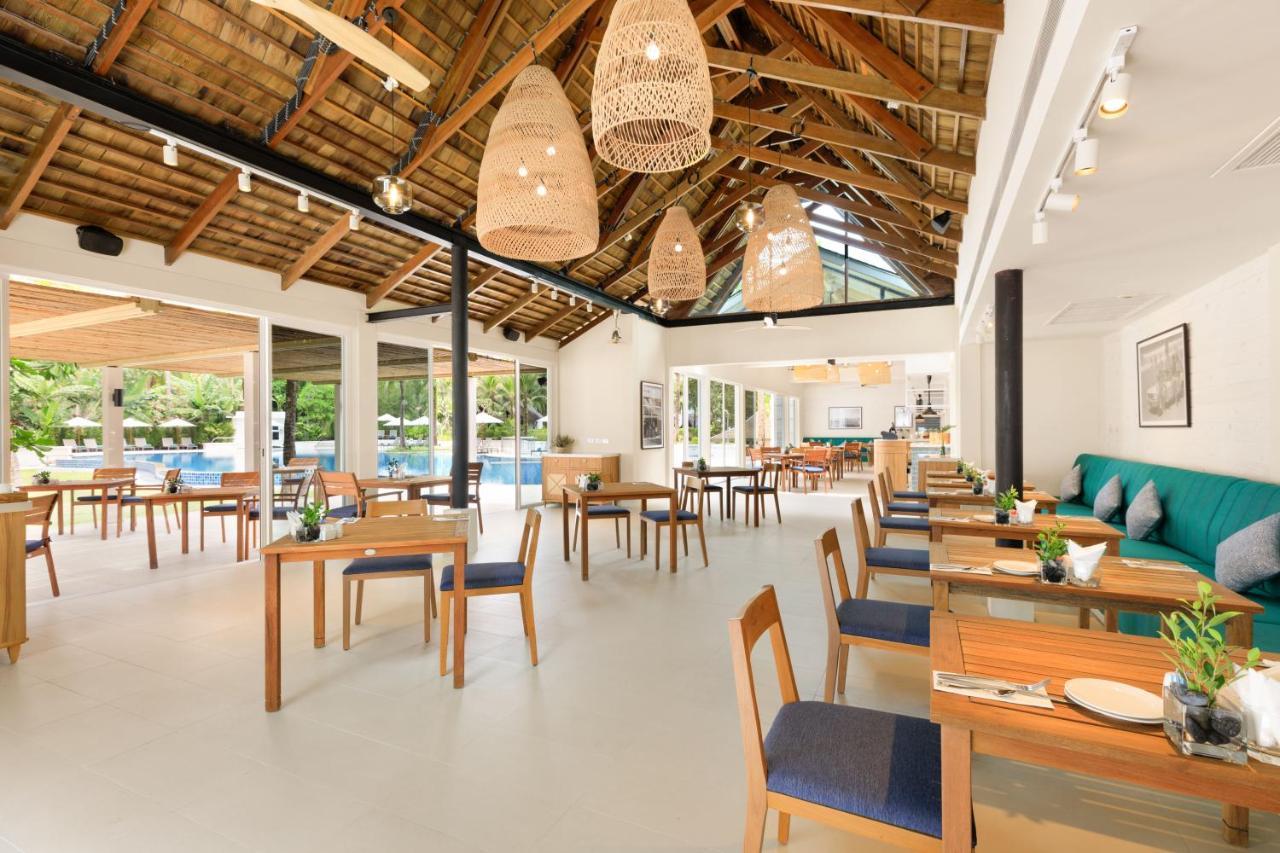 Outrigger Khao Lak Beach Resort - Sha Extra Plus Exterior photo The restaurant at the resort