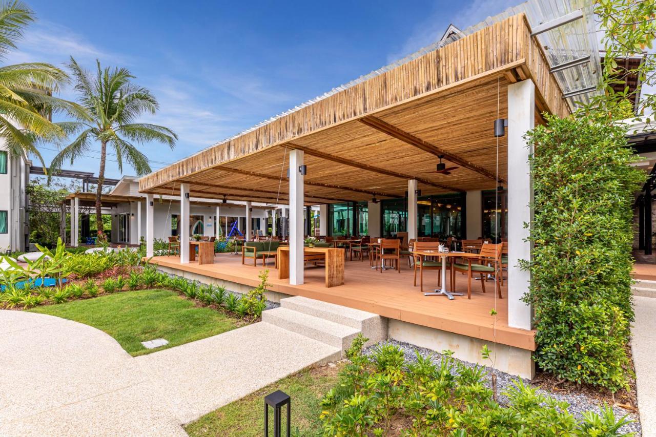 Outrigger Khao Lak Beach Resort - Sha Extra Plus Exterior photo The restaurant at the resort