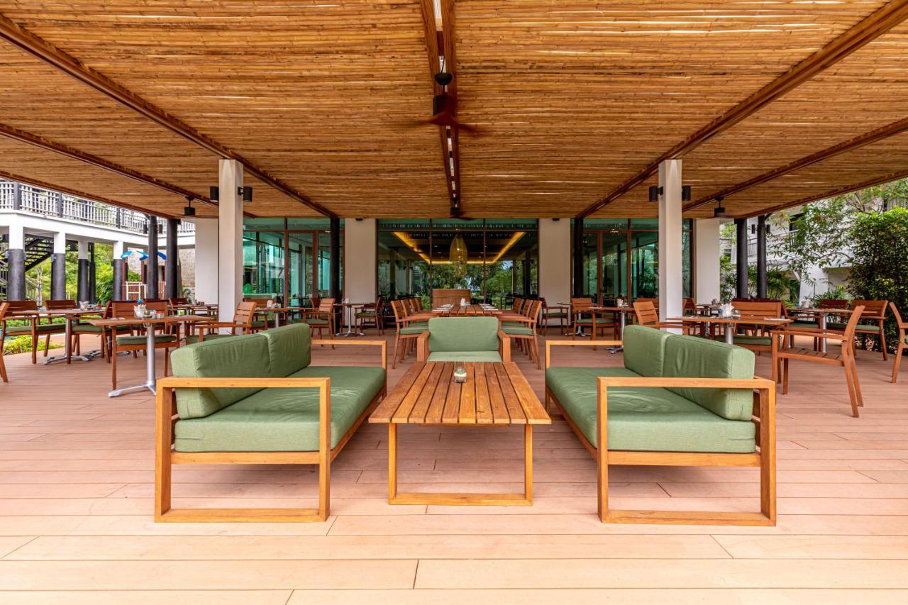 Outrigger Khao Lak Beach Resort - Sha Extra Plus Exterior photo The restaurant at the hotel